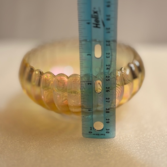 Vintage Carnival Glass Ribbed Candy Dish
Measures approx.: 5" x 2.5" - Picture 6 of 7